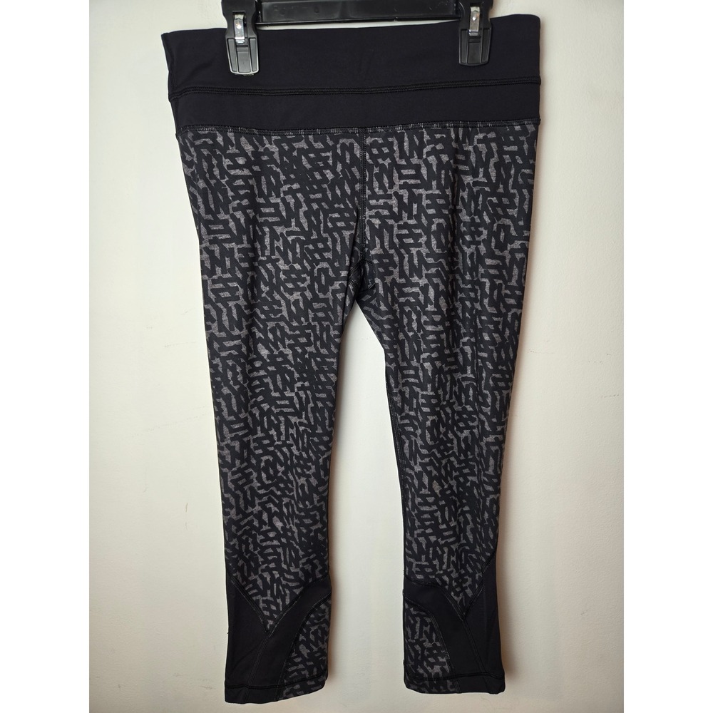 Lululemon Black net Print Run Inspire Crop II Block it Pocket‎ Leggings Size 6